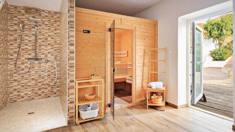 Finnish wooden sauna with mosaic rain shower and direct garden access at Cortijo El Sarmiento – wellness retreat in Mojácar